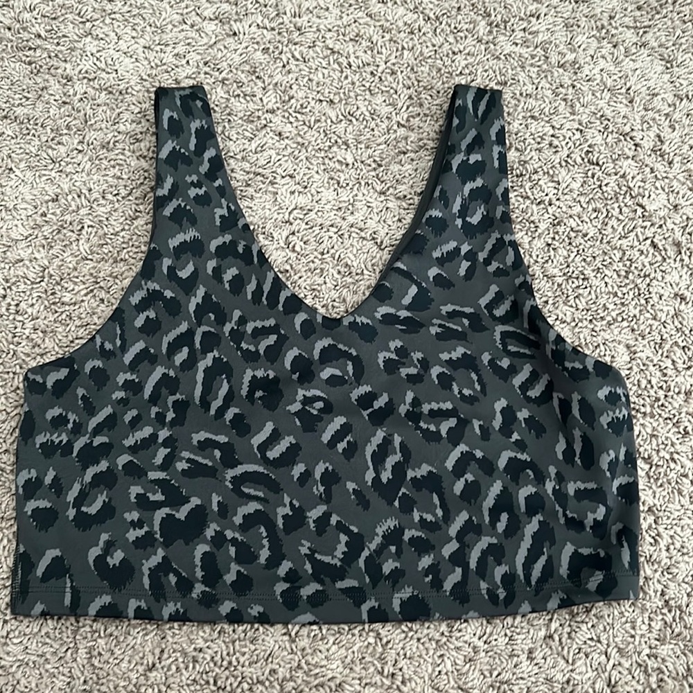 Arie cheetah print workout top